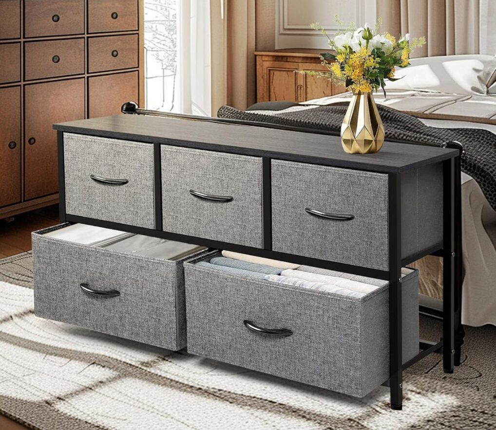 Grey 5-drawer dresser with two drawers opened displaying its spaciousness.